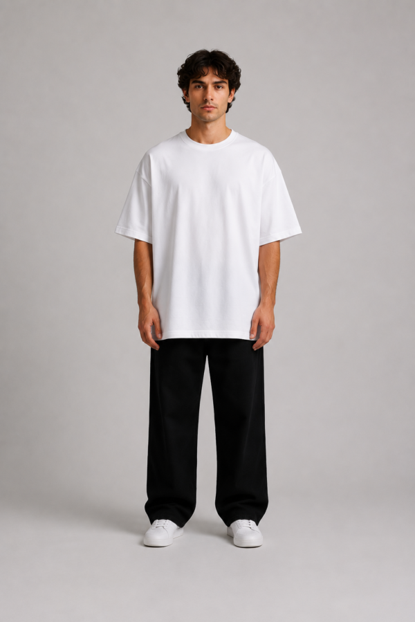 TAP White Oversized T-Shirt – Men's Front Man wearing TAP white oversized t-shirt, plain front, unisex oversized fit