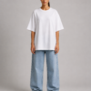 TAP White Oversized T-Shirt – Women's Front Woman wearing TAP white oversized t-shirt in unisex oversized fit, front view