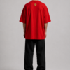 TAP Red Oversized Tee – Gold Paw Logo Back (Men's) Back of TAP red oversized tee with gold paw logo between the shoulders, male model