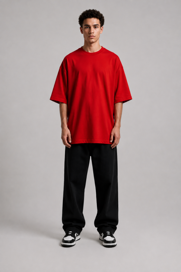 TAP Red Oversized T-Shirt – Men's Front Man wearing TAP red oversized t-shirt, plain front, unisex oversized fit