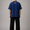TAP Navy Oversized Tee – Gold Paw Logo Back (Men's) Back of TAP navy oversized tee with gold paw logo between the shoulders, male model