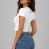 Model wearing gold bear paw crop tee with high-rise jeans - Take a Paw Model wearing gold bear paw crop tee with high-rise jeans - Take a Paw