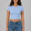 Model wearing fitted light blue crop tee, front view - Take a Paw Model wearing fitted light blue crop tee, front view - Take a Paw