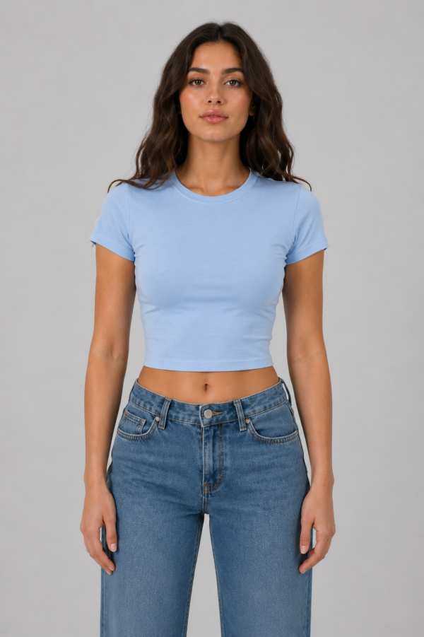 Model wearing fitted light blue crop tee, front view - Take a Paw Model wearing fitted light blue crop tee, front view - Take a Paw